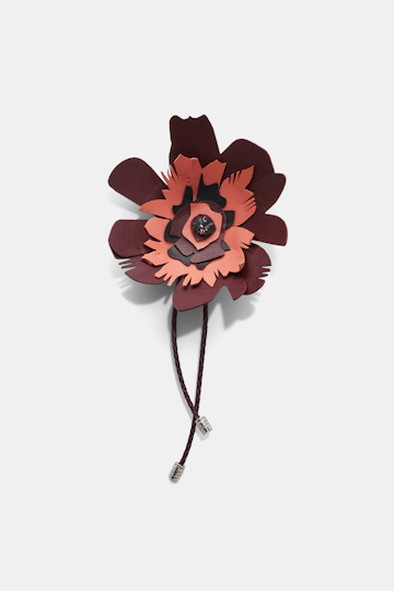 Dorothee Schumacher Woven leather brooch with leather flower bordeaux