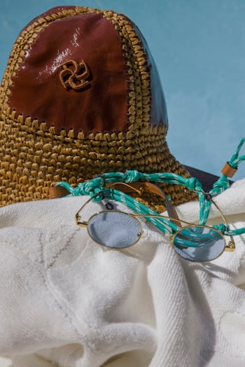 Dorothee Schumacher Crinkle patent leather and crochet bucket hat patched raffia