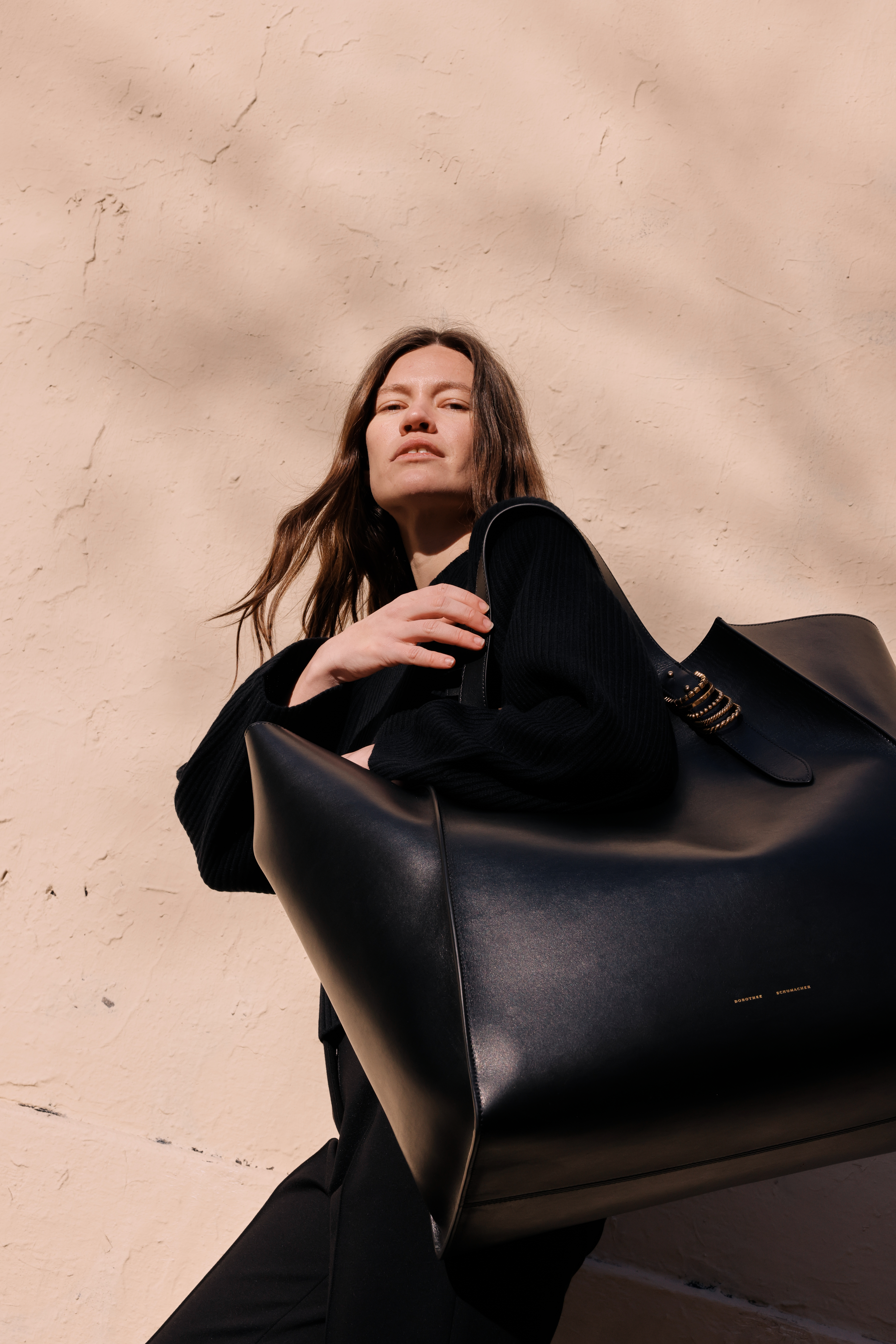 Model with Dorothhe Schumacher Leather Bag