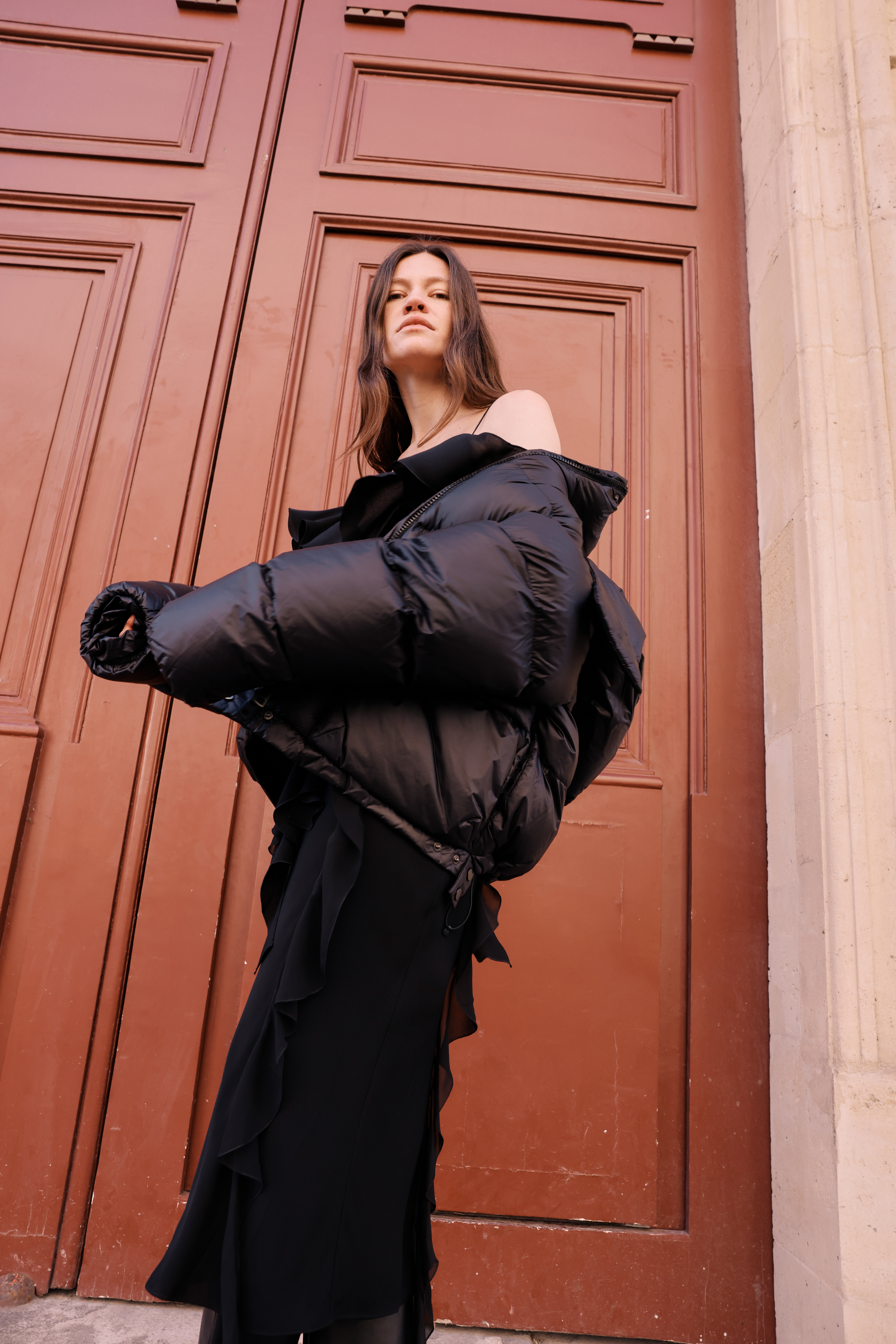 Model with black puffer jacket