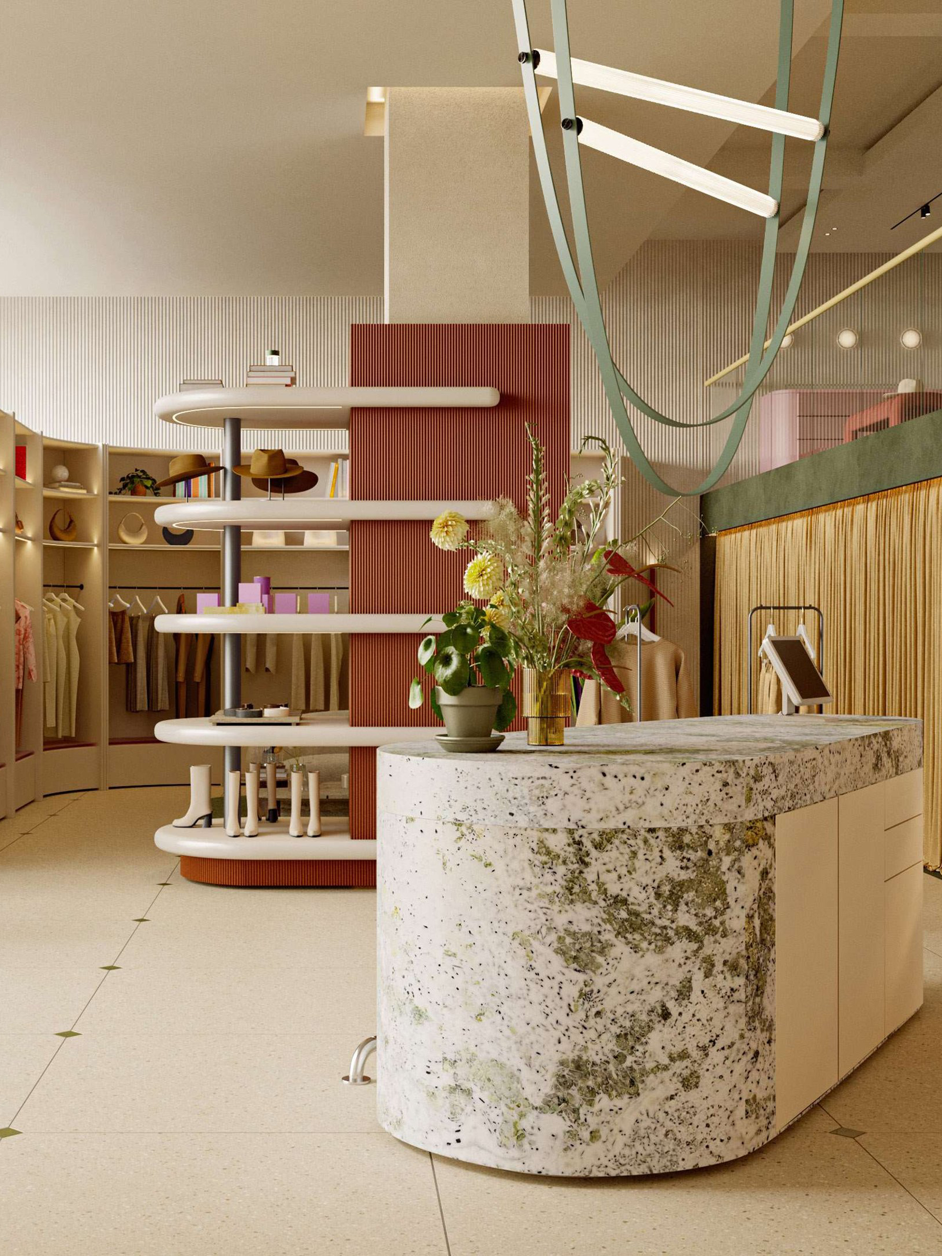  “Interior view of Dorothee Schumacher store with window display, mannequins and marble counter”