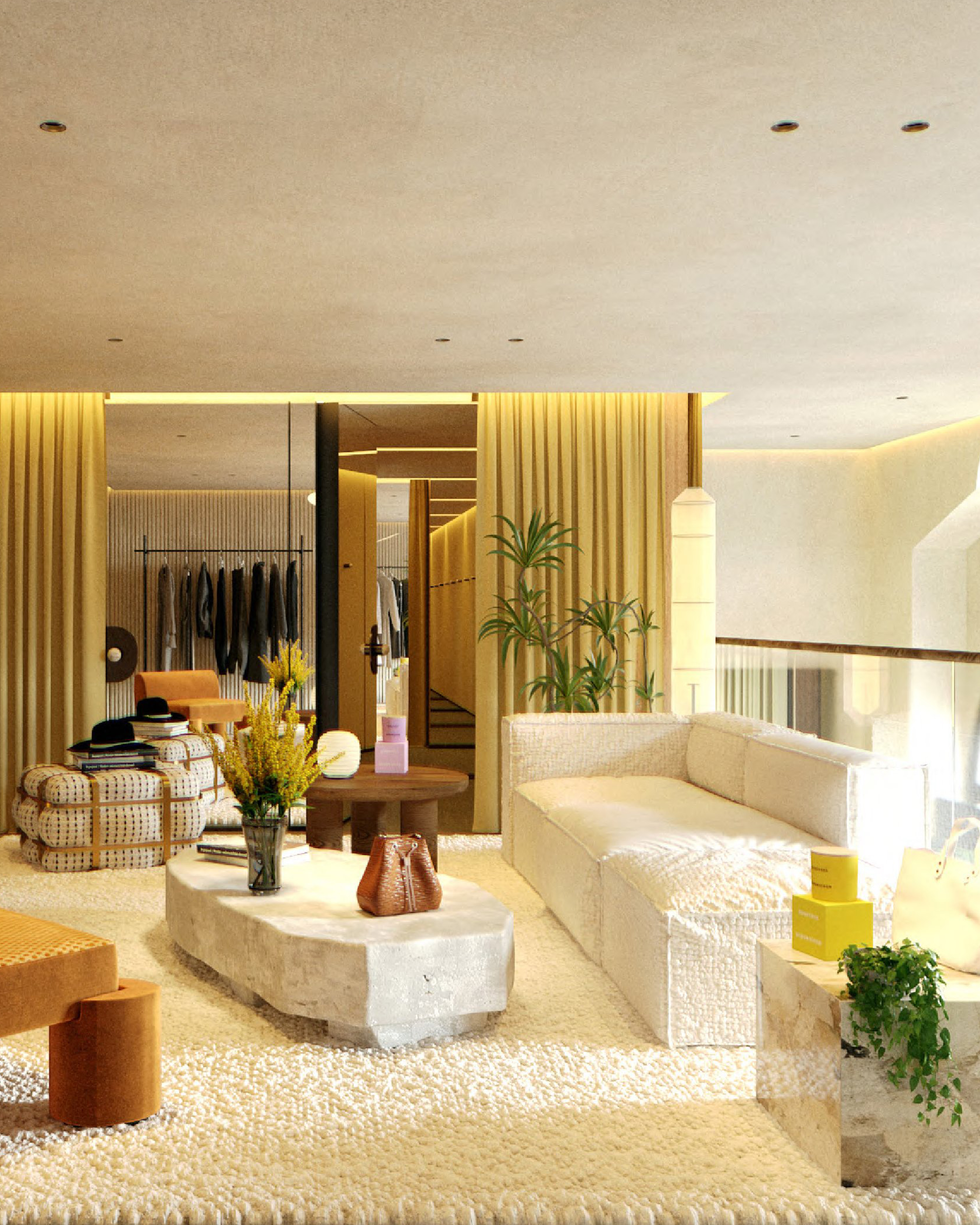 Ein luxuriöser Lounge-Bereich im Dorothee Schumacher Geschäft mit einem großen weißen Sofa, einem Couchtisch aus Beton und einem flauschigen Teppich.