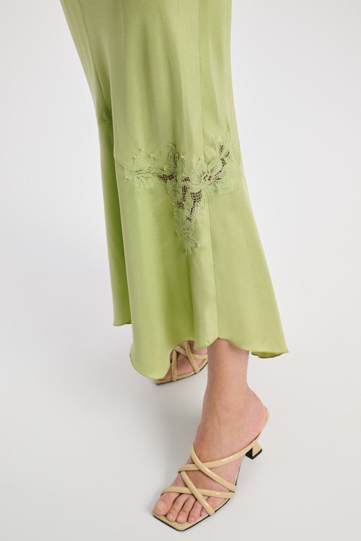 Dorothee Schumacher Silk twill lingerie skirt with an asymmetric lace insert happy green