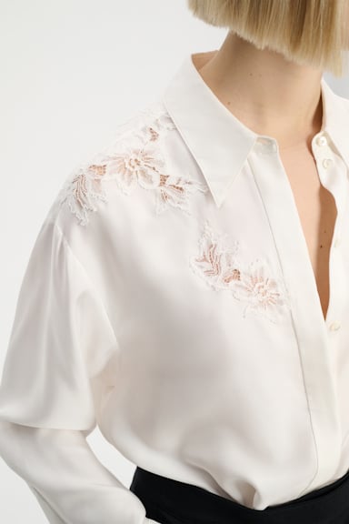 Dorothee Schumacher Silk twill shirt with asymmetric lace inserts on one shoulder and sleeve camellia white