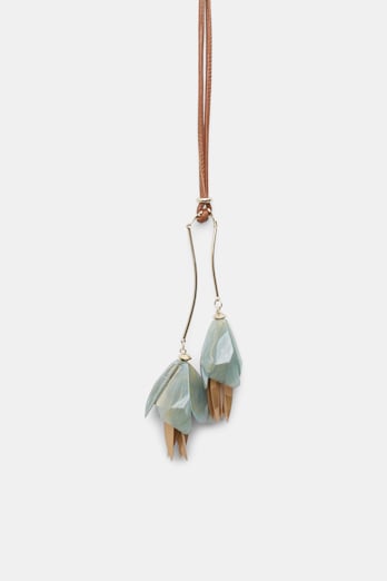 Dorothee Schumacher Necklace with hanging flower pendant on leather cord sage green