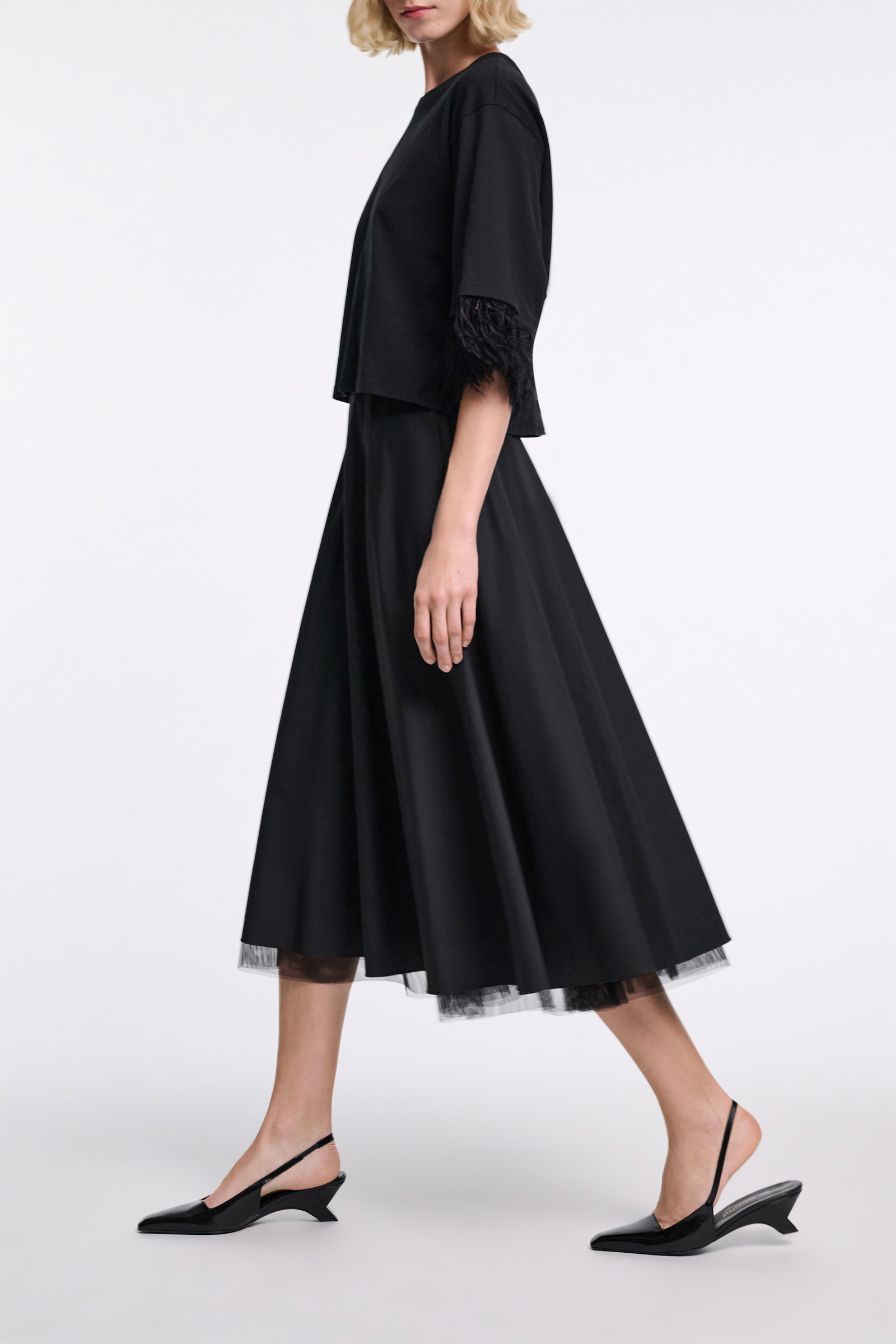 Dorothee Schumacher Boxy T-shirt with ostrich feather cuffs pure black
