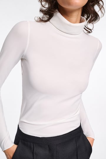 Dorothee Schumacher Technical jersey long sleeve turtleneck camellia white
