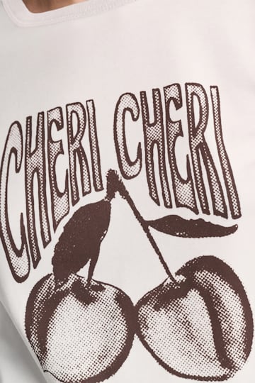 Dorothee Schumacher Rundhalsshirt mit "CHERI CHERI" Print camellia white