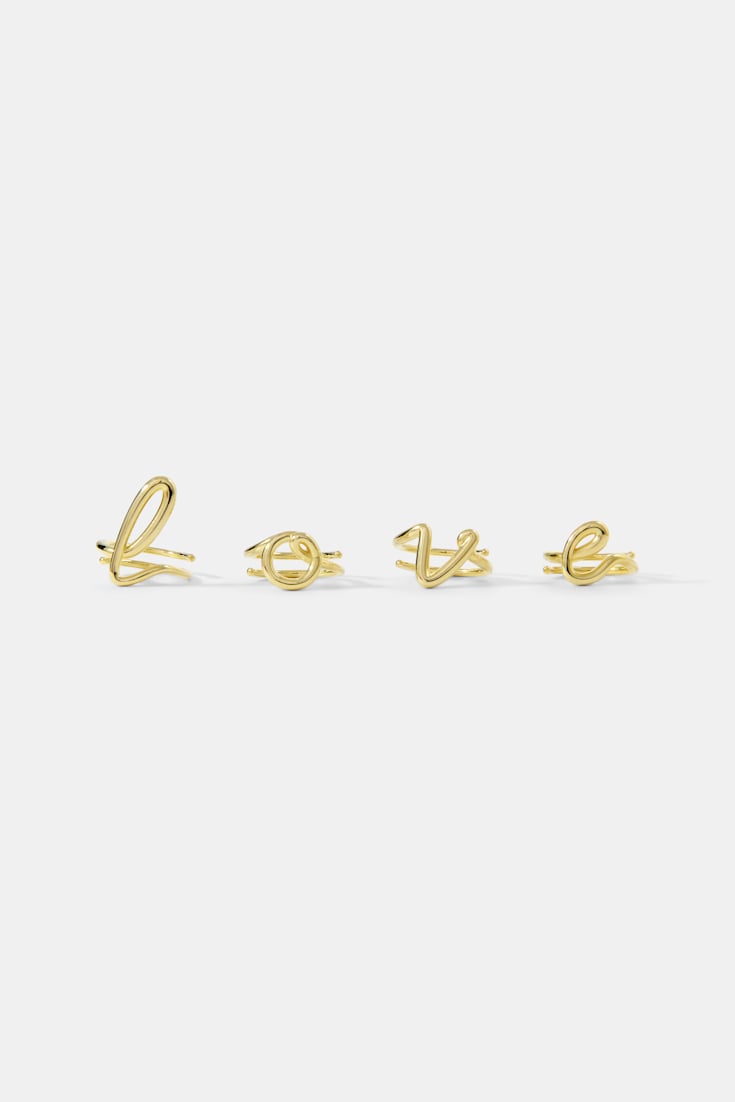 Dorothee Schumacher Set of 4 gold-plated LOVE rings gold
