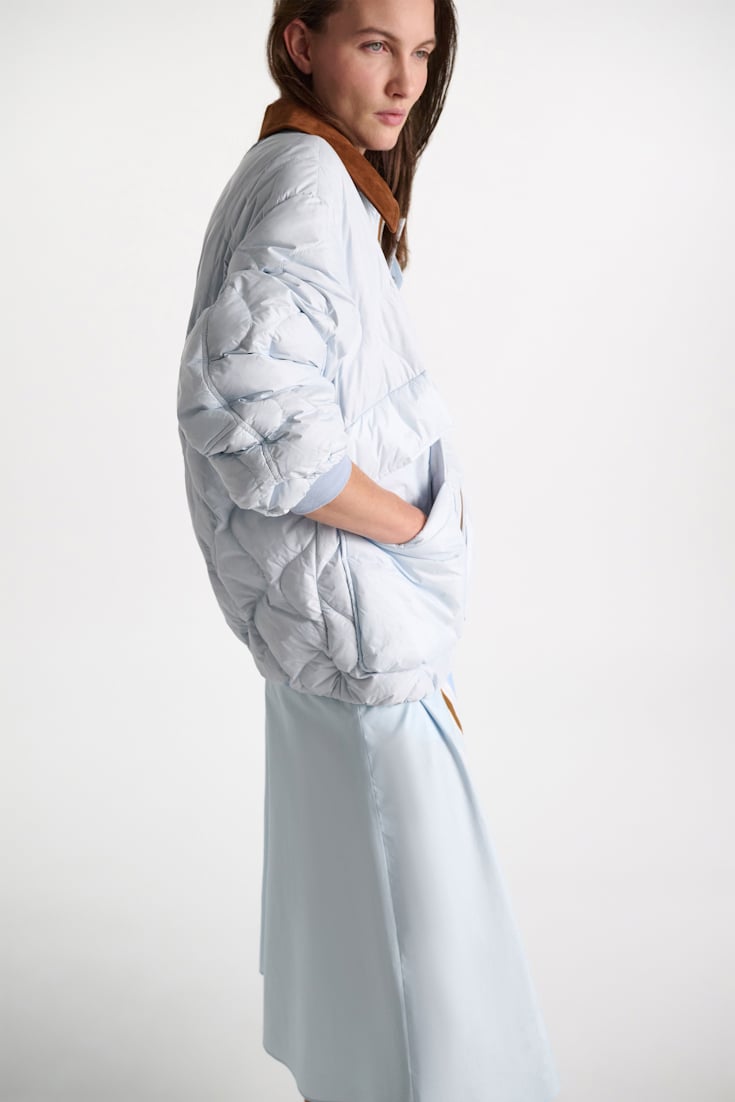 Dorothee Schumacher Down jacket with faux leather collar ice sky