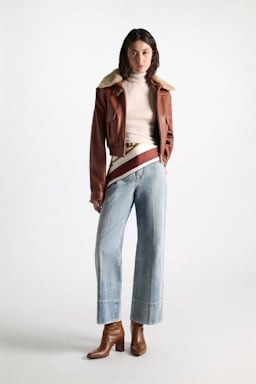 Dorothee Schumacher Sleeveless turtleneck in extra fine Merino camellia white