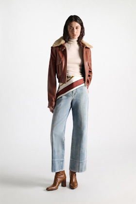 Dorothee Schumacher Sleeveless turtleneck in extra fine Merino camellia white Model Front View