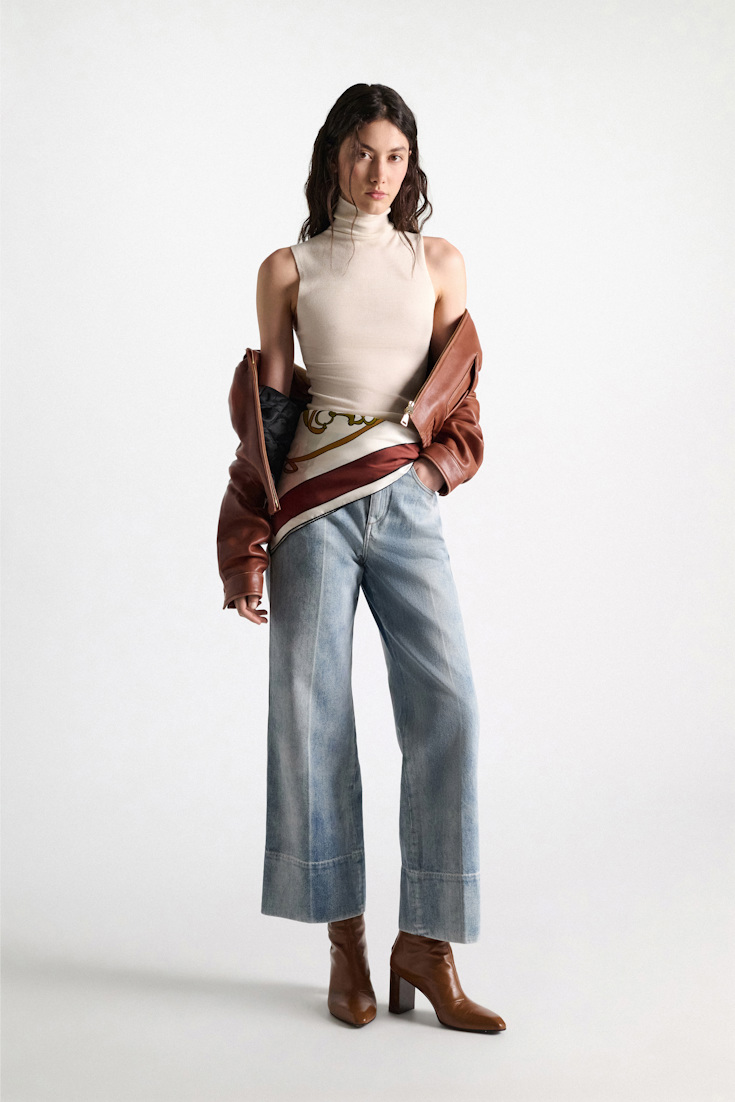 Dorothee Schumacher Sleeveless turtleneck in extra fine Merino camellia white