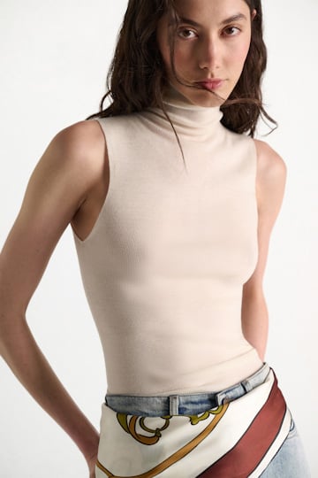 Dorothee Schumacher Sleeveless turtleneck in extra fine Merino camellia white