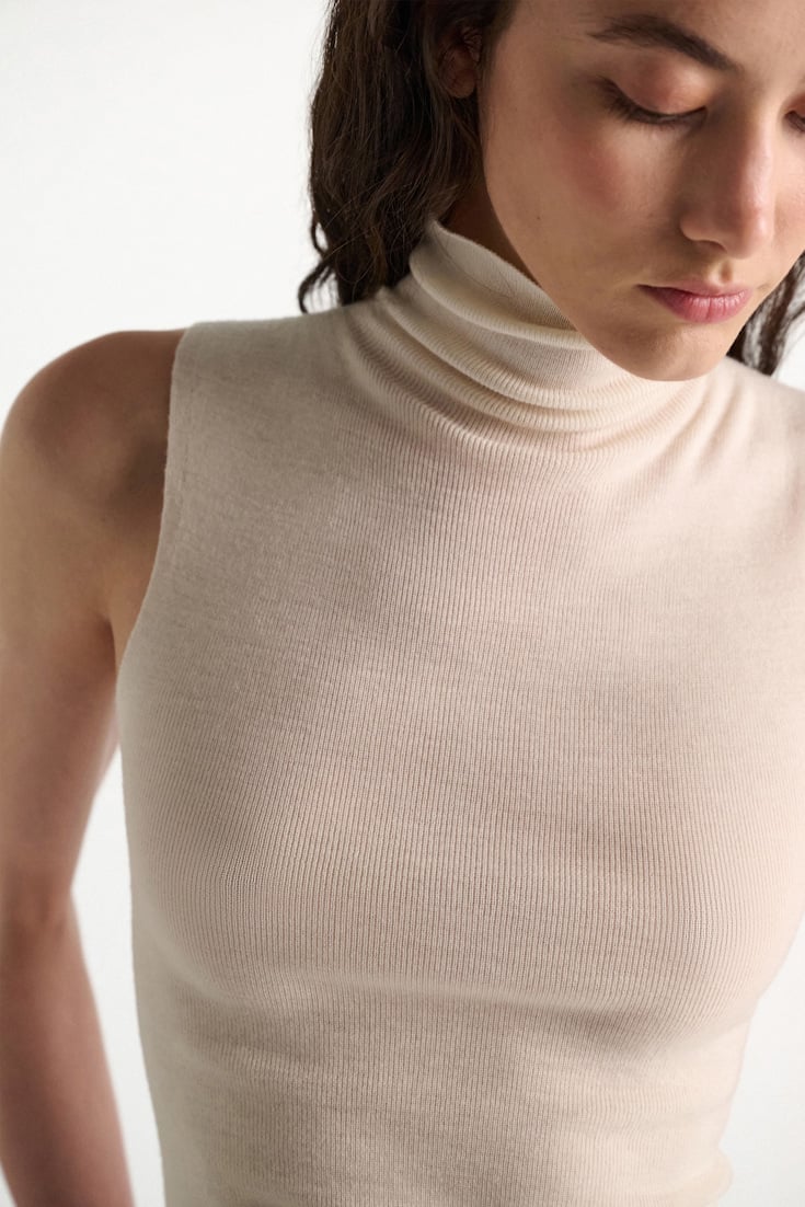 Dorothee Schumacher Sleeveless turtleneck in extra fine Merino camellia white