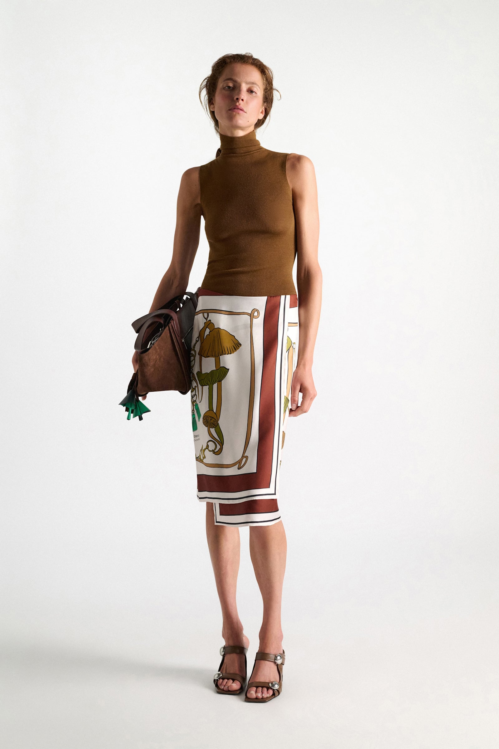 Dorothee Schumacher Sleeveless turtleneck in extra fine Merino saffron
