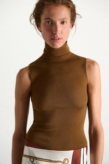 Dorothee Schumacher Sleeveless turtleneck in extra fine Merino saffron