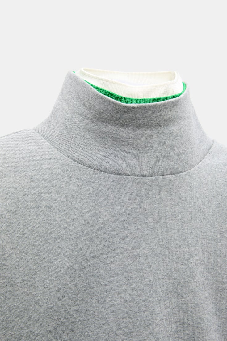 Dorothee Schumacher Fine rib cotton turtleneck with two-tone collar grey mel. patch