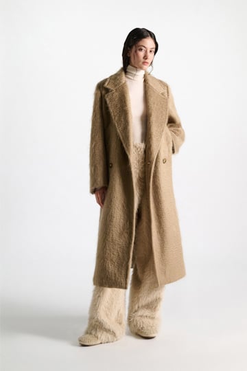 Dorothee Schumacher Shearling sneakers cream