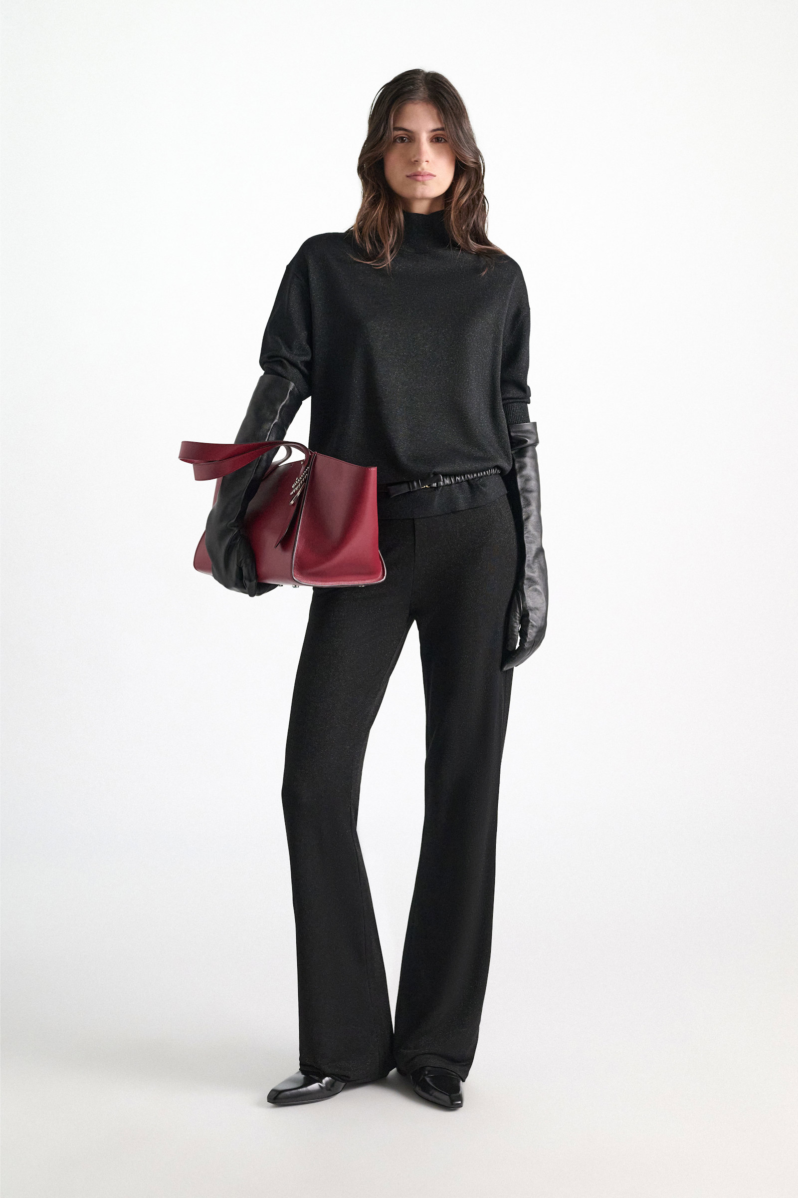 Dorothee Schumacher Rollkragenpullover aus Lurex-Merino-Mix vinyl black Model Front View