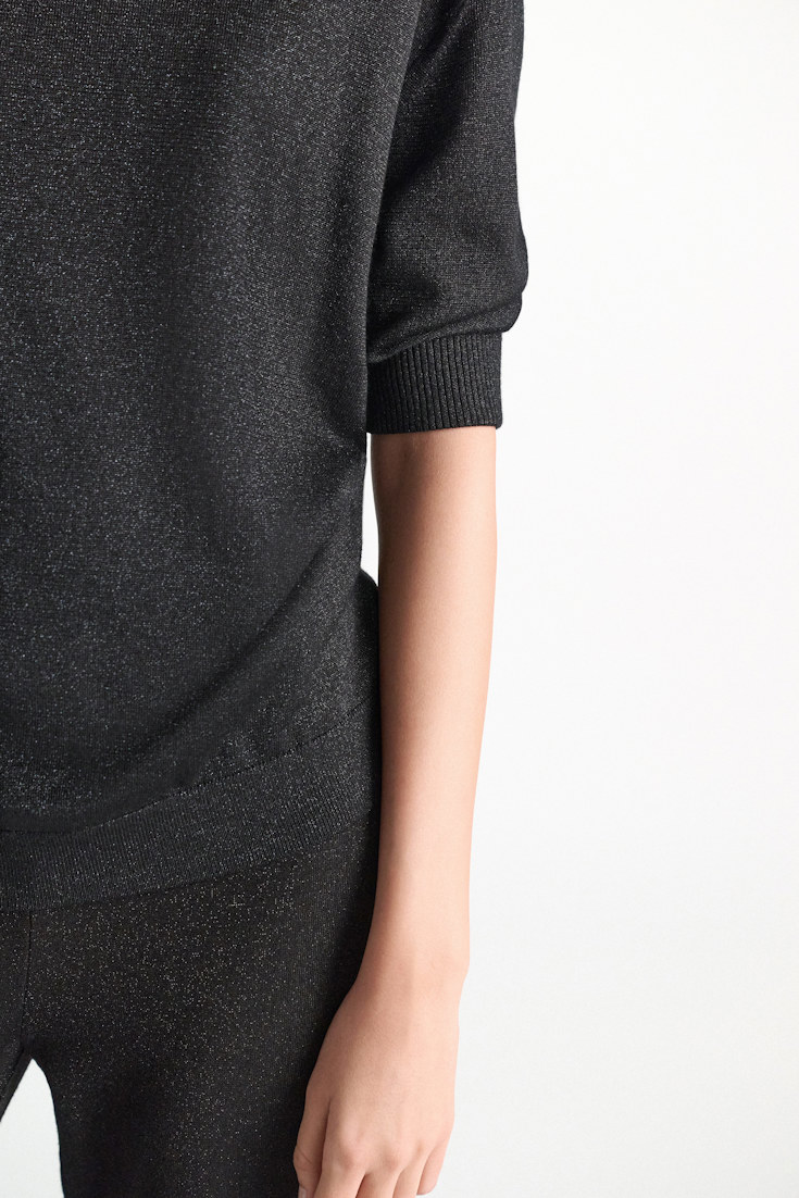 Dorothee Schumacher Rollkragenpullover aus Lurex-Merino-Mix vinyl black Model Detail View