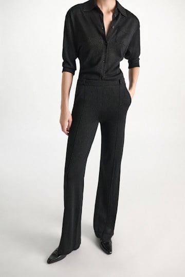 Dorothee Schumacher Shimmering Lurex-Merino knit pants vinyl black Model Detail View
