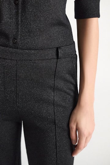 Dorothee Schumacher Shimmering Lurex-Merino knit pants vinyl black Model Detail View