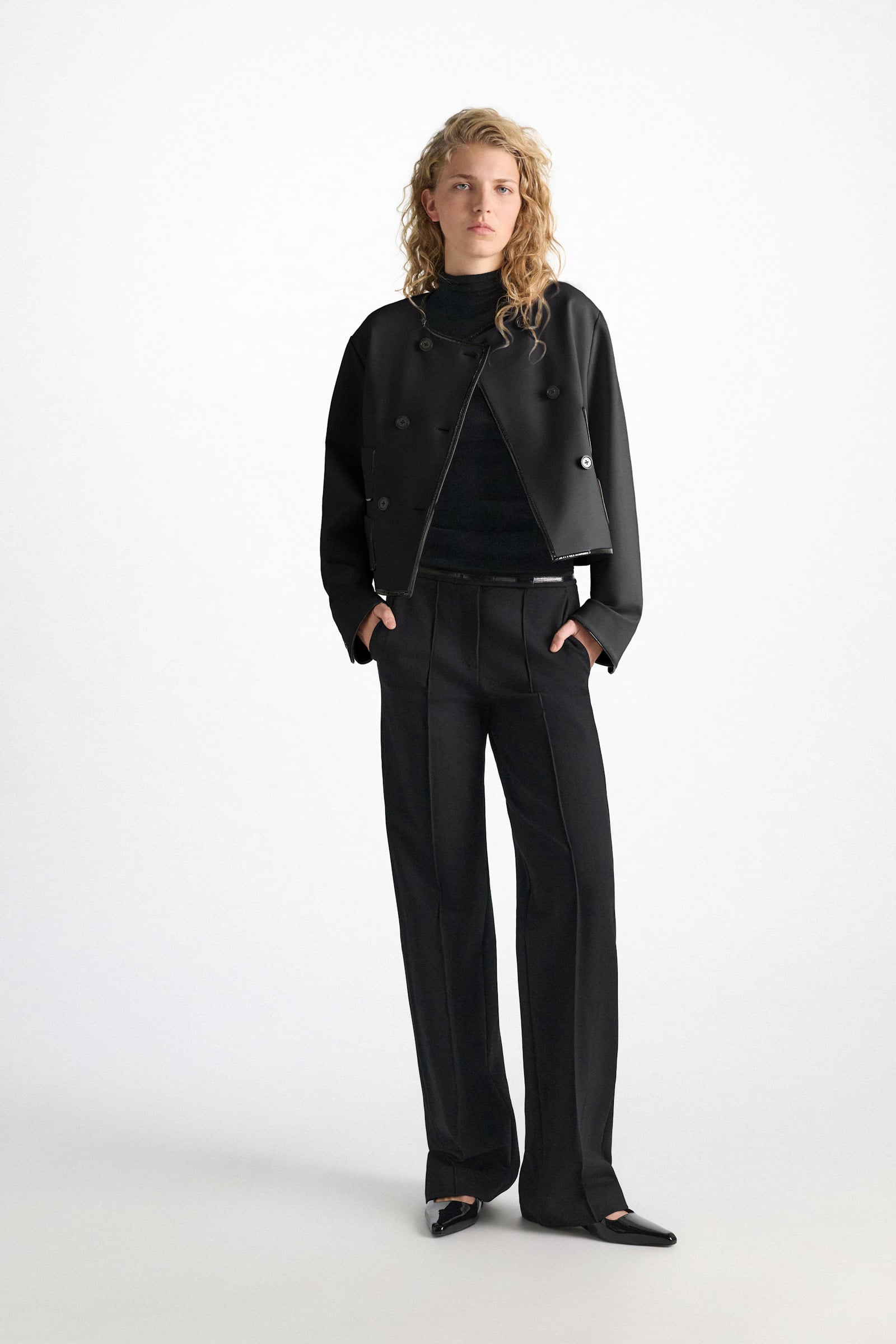 Dorothee Schumacher Wide leg pants in Punto Milano with patent vinyl black Model Detail View