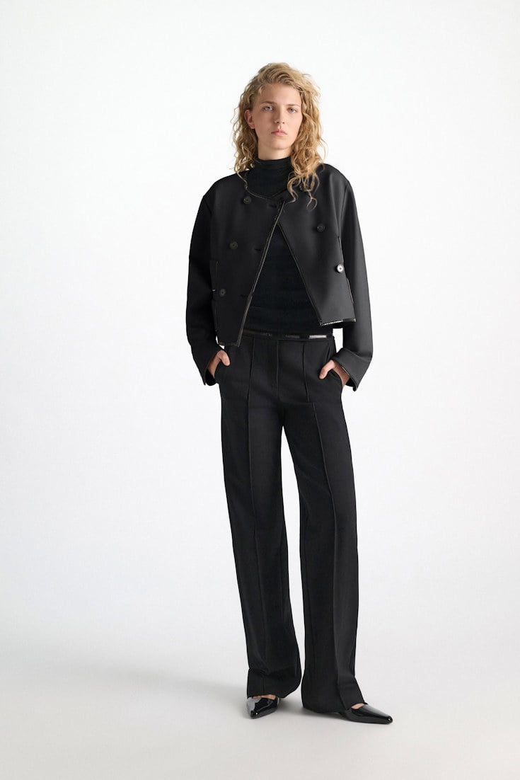 Dorothee Schumacher Wide leg pants in Punto Milano with patent vinyl black Model Detail View