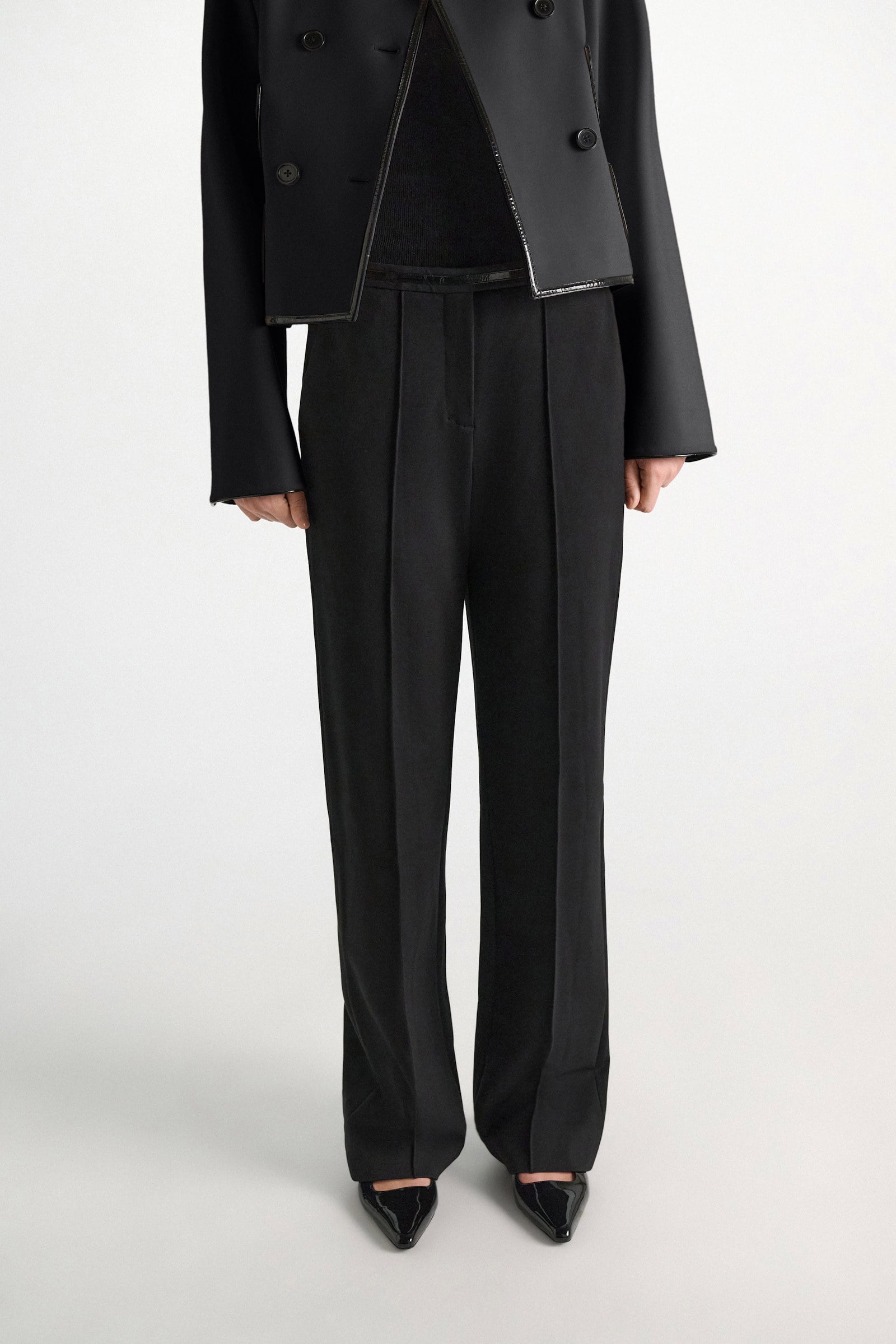 Dorothee Schumacher Wide leg pants in Punto Milano with patent vinyl black Model Detail View