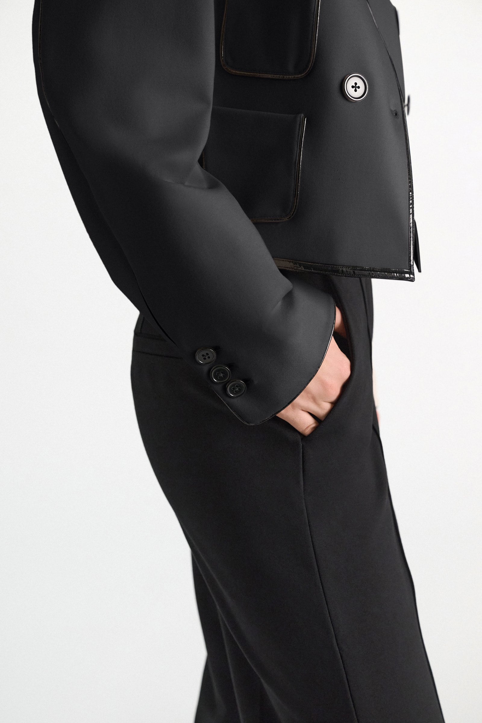 Dorothee Schumacher Wide leg pants in Punto Milano with patent vinyl black Model Detail View