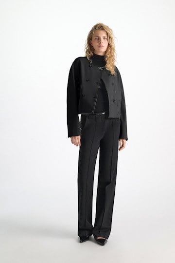 Dorothee Schumacher Cropped jacket in Punto Milano with patent vinyl black Model Front View