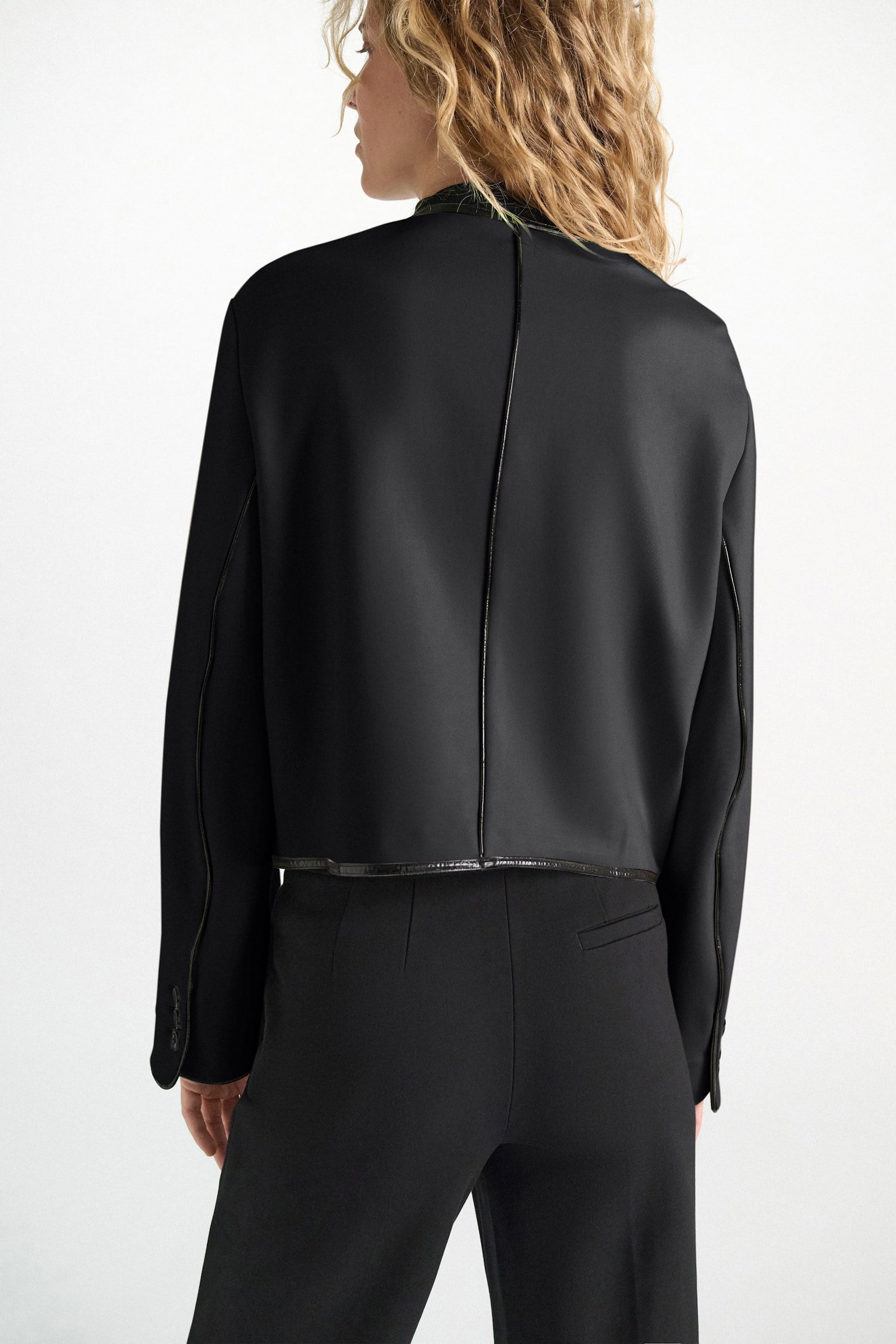 Dorothee Schumacher Cropped jacket in Punto Milano with patent vinyl black Model Detail View