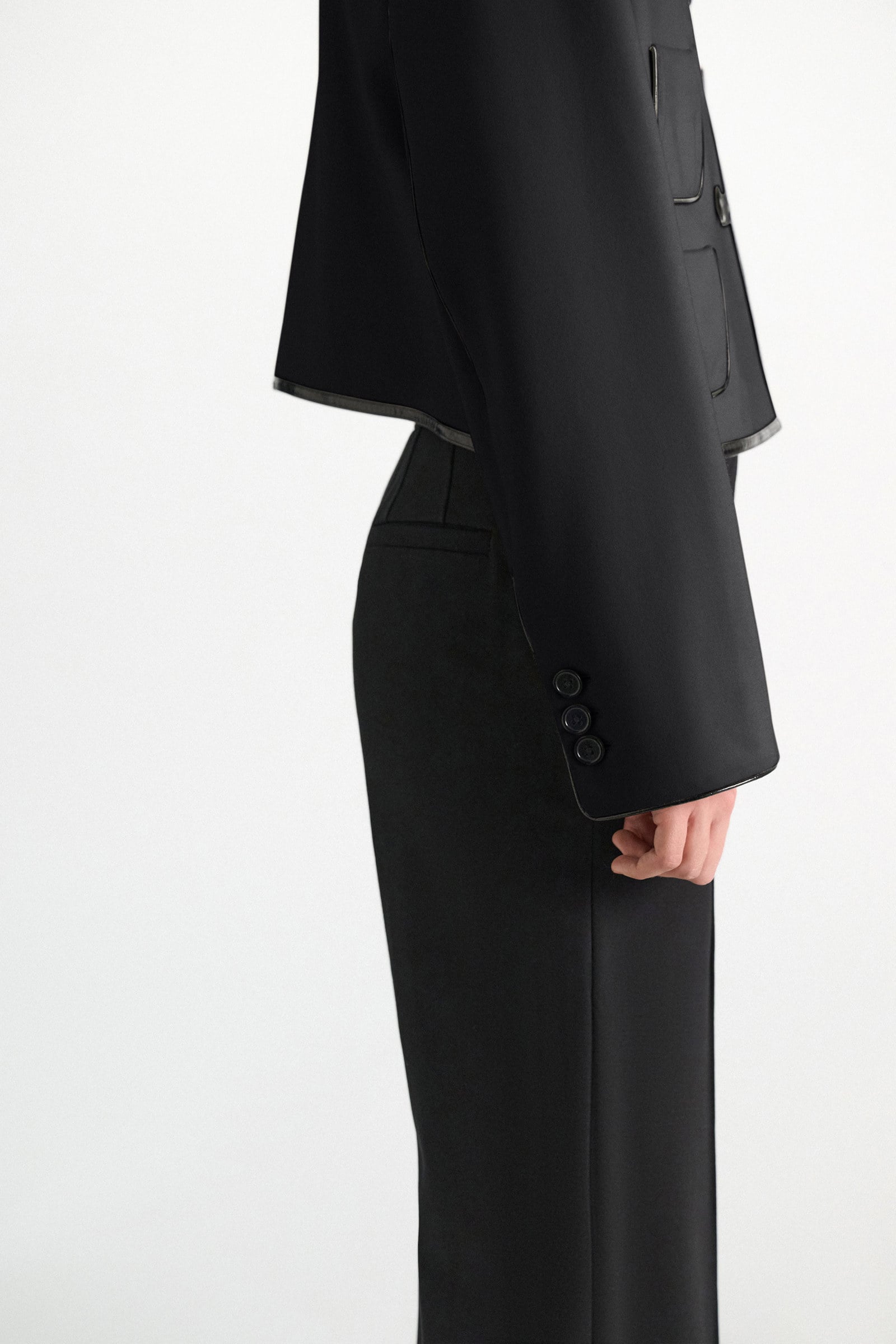 Dorothee Schumacher Cropped jacket in Punto Milano with patent vinyl black Model Detail View
