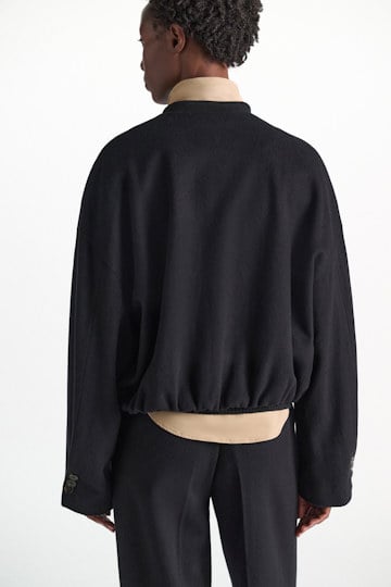 Dorothee Schumacher Blouson jacket in brushed wool vinyl black Model Detail View