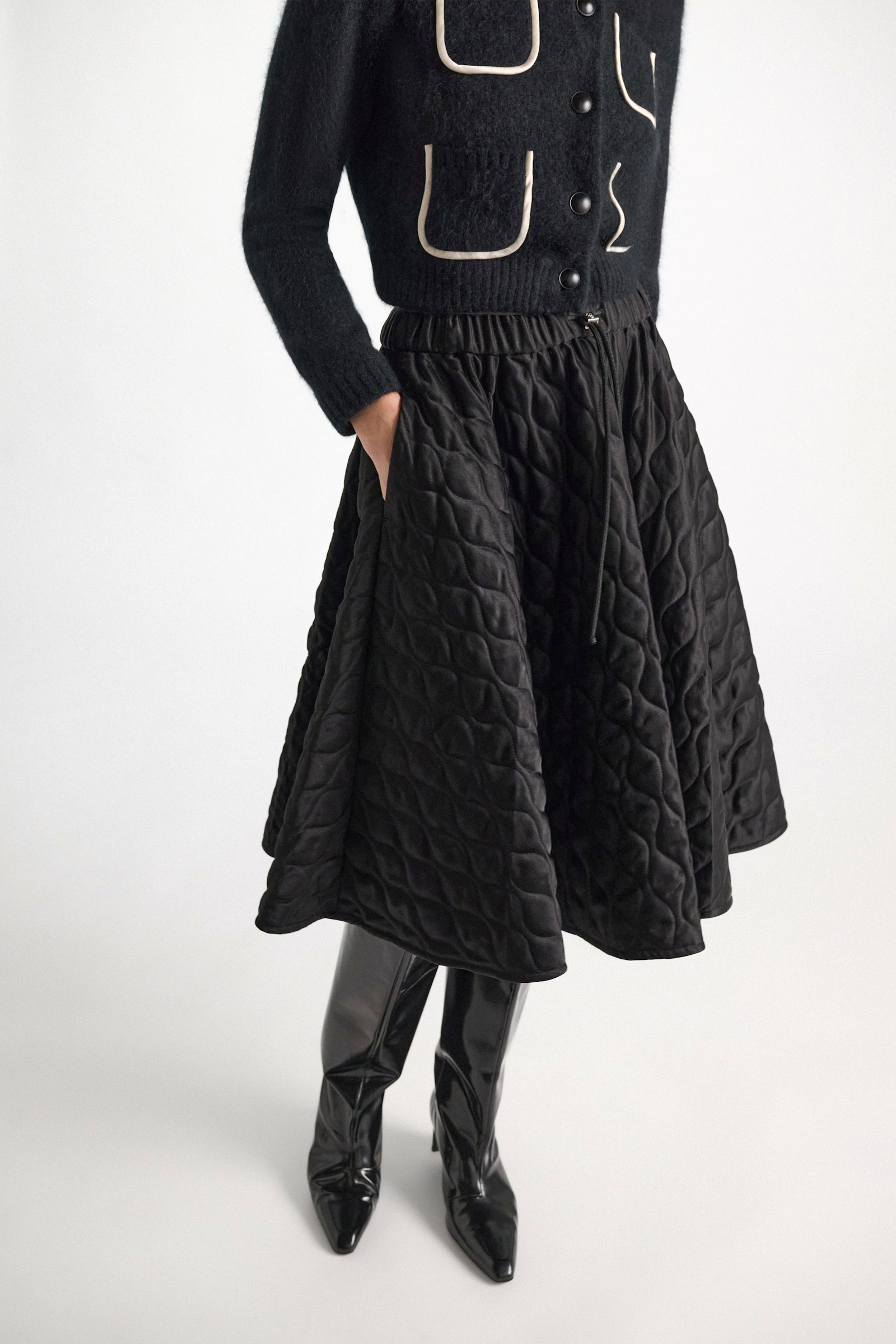 Dorothee Schumacher Quilted skirt in Japanese satin vinyl black Model Detail View