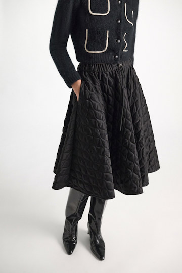 Dorothee Schumacher Quilted skirt in Japanese satin vinyl black Model Detail View