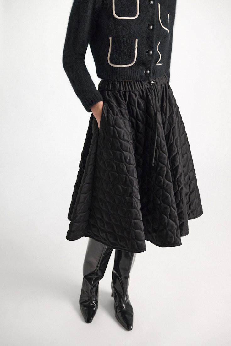 Dorothee Schumacher Quilted skirt in Japanese satin vinyl black Model Detail View