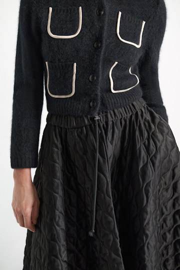 Dorothee Schumacher Quilted skirt in Japanese satin vinyl black Model Detail View