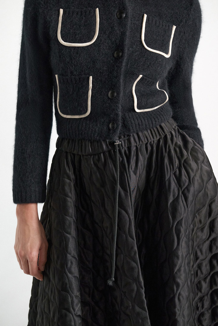 Dorothee Schumacher Quilted skirt in Japanese satin vinyl black Model Detail View