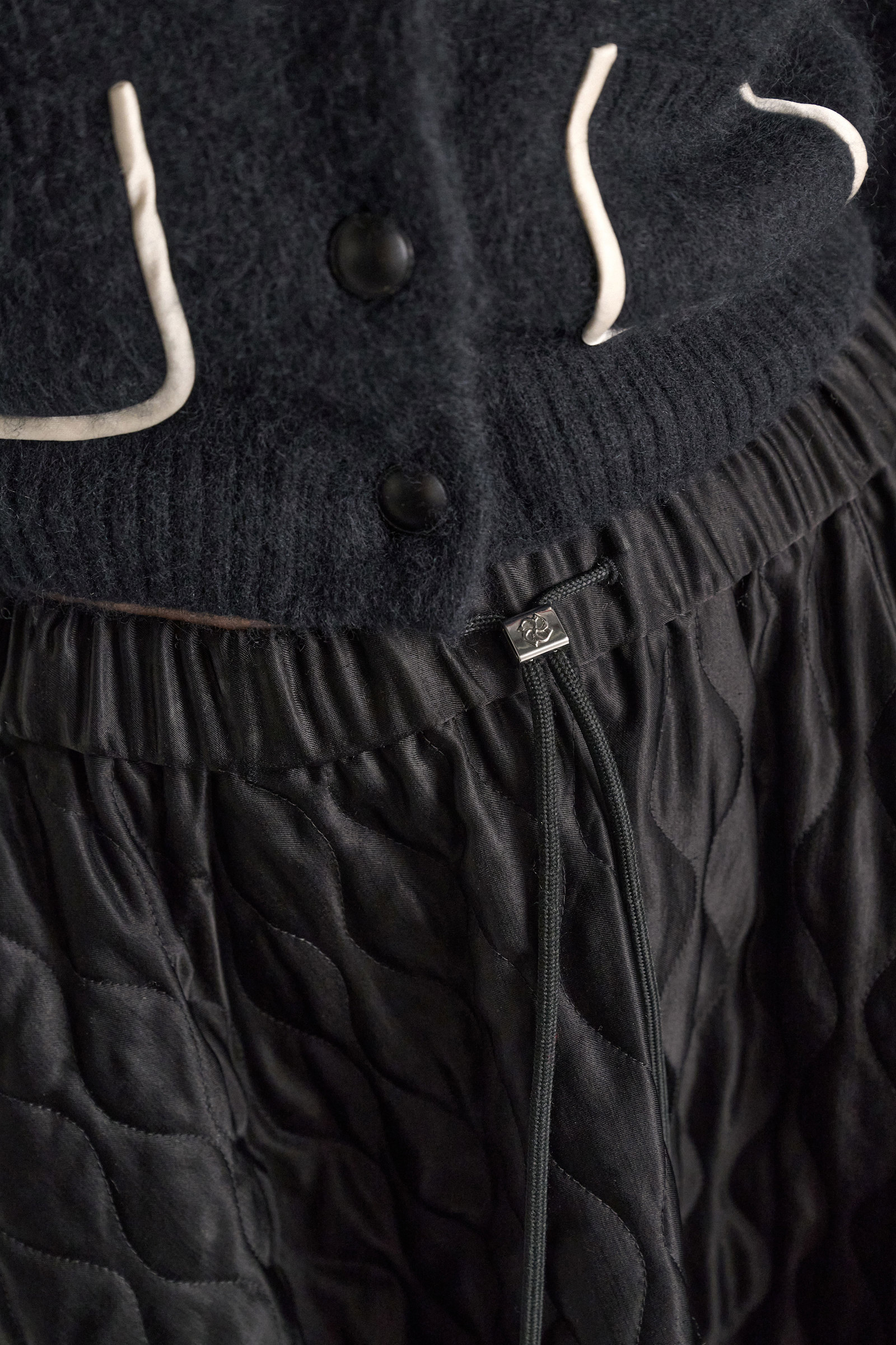 Dorothee Schumacher Quilted skirt in Japanese satin vinyl black Model Detail View