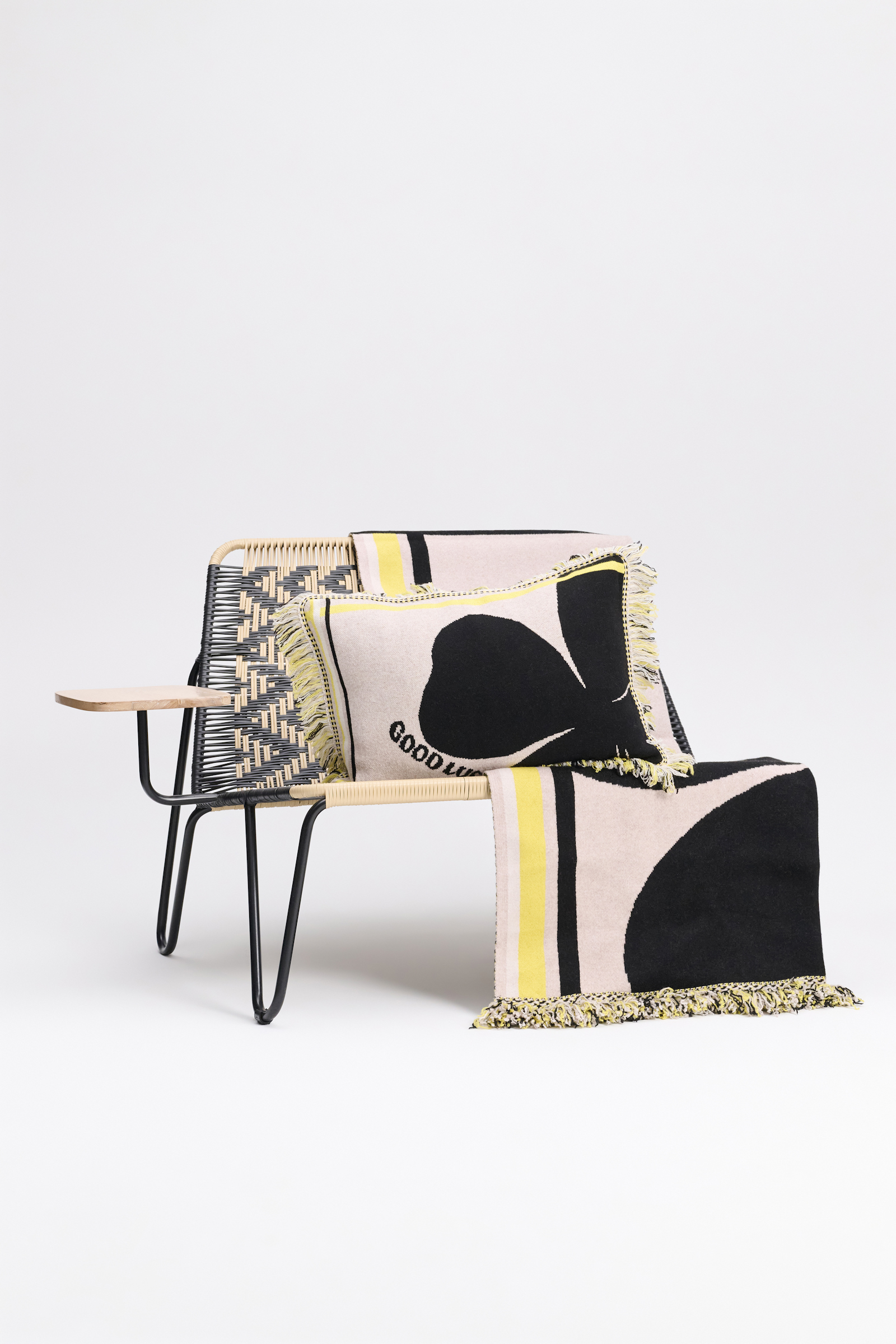 Dorothee Schumacher Wool cushion with GOOD LUCK clover motif beige/black/yellow