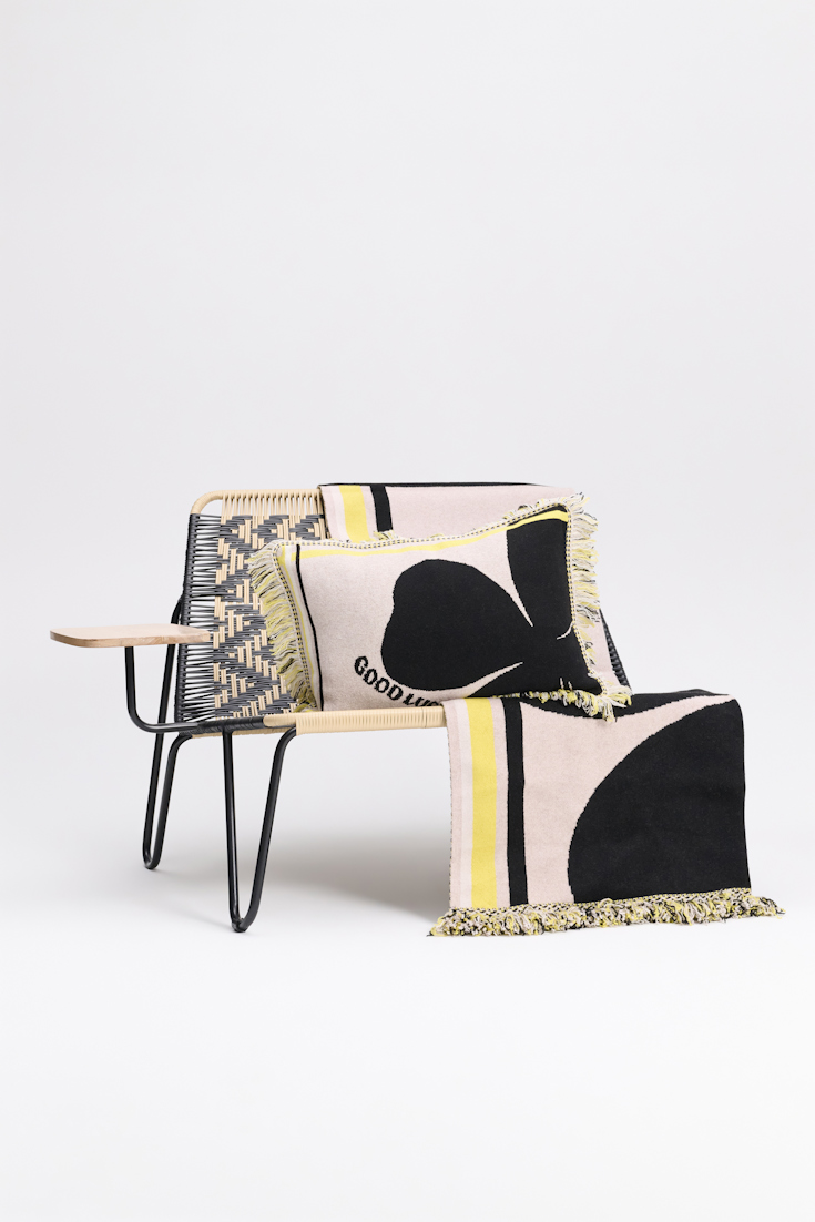 Dorothee Schumacher Wool cushion with GOOD LUCK clover motif beige/black/yellow