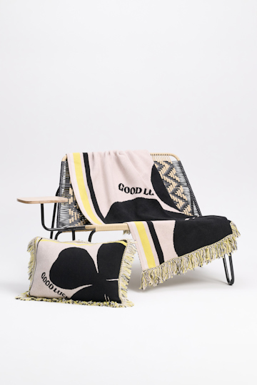 Dorothee Schumacher Wool cushion with GOOD LUCK clover motif beige/black/yellow