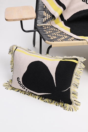 Dorothee Schumacher Wool cushion with GOOD LUCK clover motif beige/black/yellow