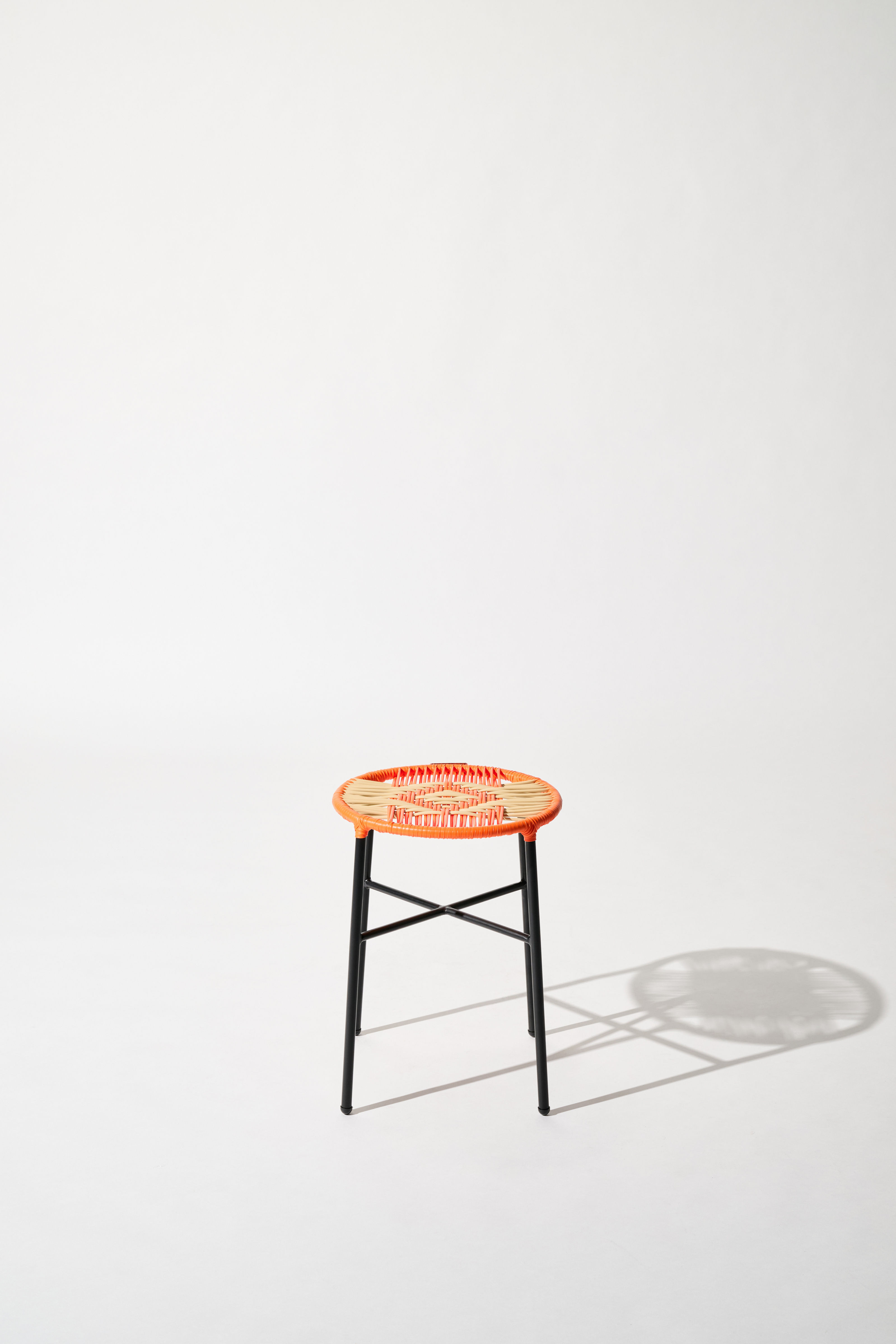 Dorothee Schumacher Handwoven stool rojo vino orange mix