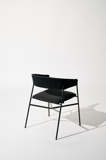 Dorothee Schumacher Handwoven chair for indoors black beige mix