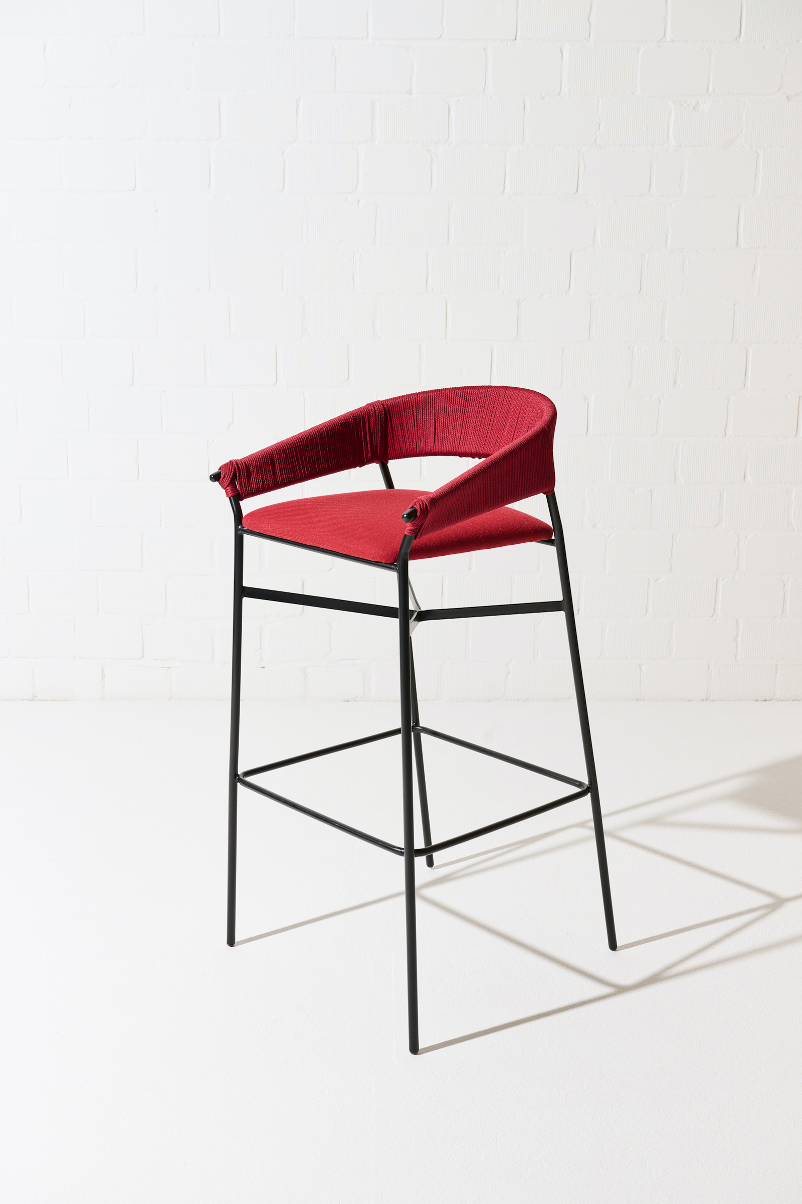 Dorothee Schumacher Hand-woven indoor bar stool with cushion rojo vino beige mix