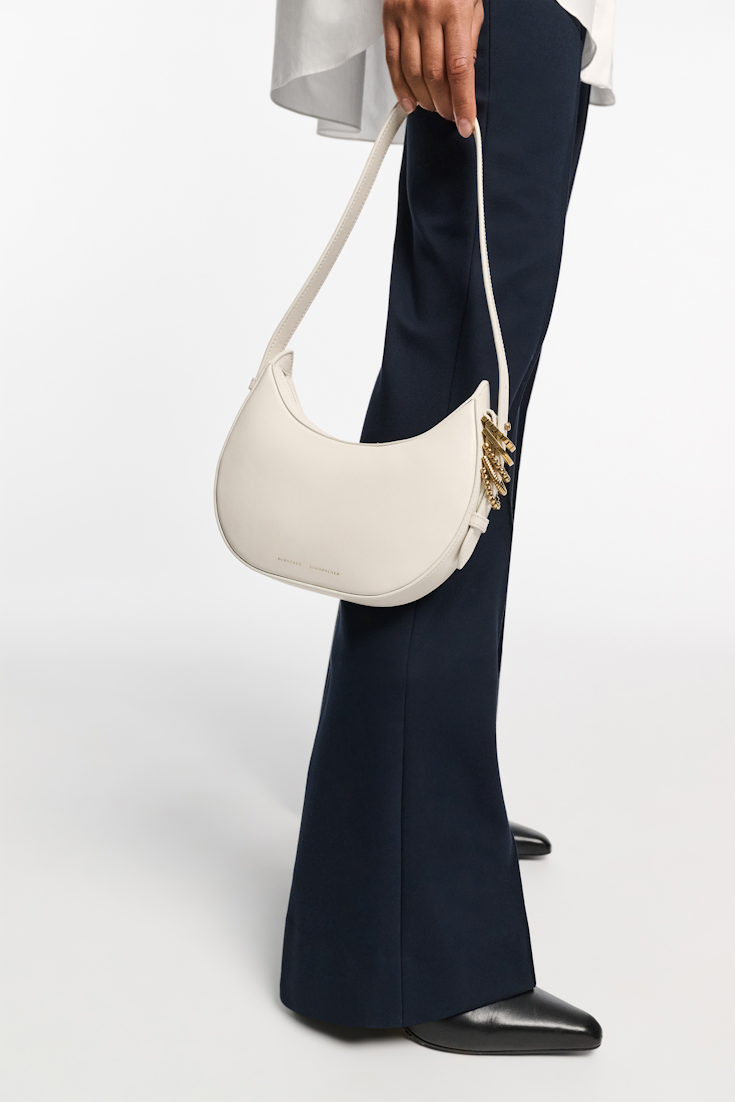 Dorothee Schumacher Half Moon Mini Bag in soft calf leather with D-ring hardware off white