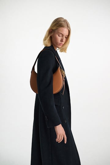 Dorothee Schumacher Half Moon Bag in soft calf leather with D-ring hardware tan